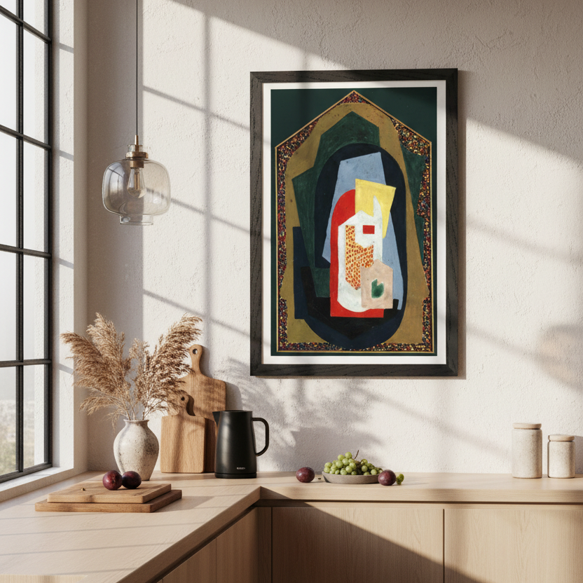 Decoration (1923) by Mainie Jellett, framed print with geometric shapes in green, gold, red and blue, hanging on a beige wall in a modern kitchen with wooden cabinets and a glass pendant light
