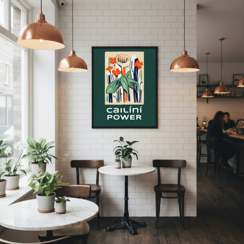 Cailíní Power feminist art hanging in an independent Irish café with white subway tiles, copper lighting, small round marble tables and plants.